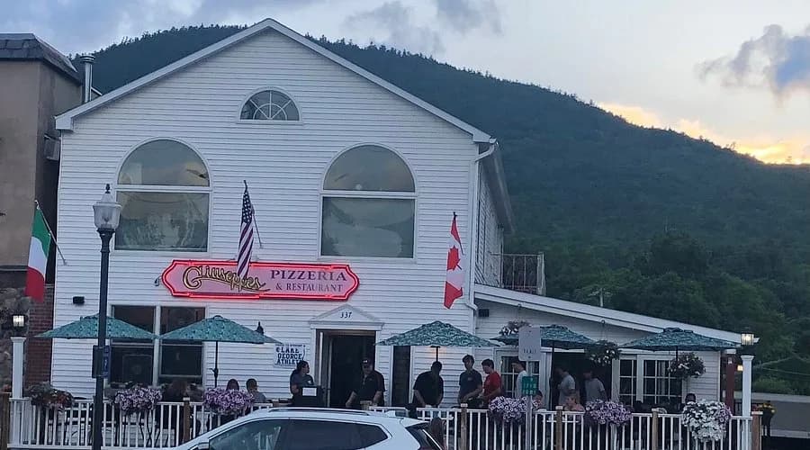 Giuseppe's patio at dusk with the Adirondack mountains in the background