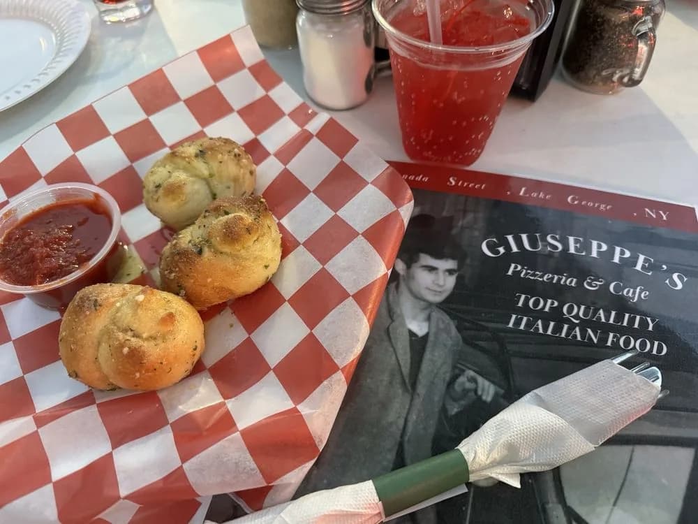A basket of fresh baked garlic knots